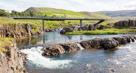 Bridge over a small river and the car on it, Icelandの写真素材