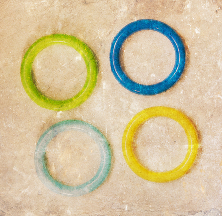 Toy, color plastic rings isolated on solid backgroundの写真素材