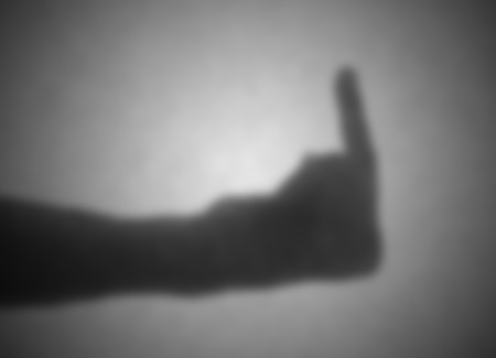 Silhouette behind a transparent paper - Blurred - The fingerの写真素材