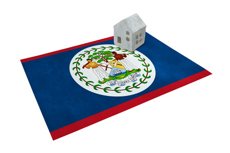 Small house on a flag - Living or migrating to Belizeの写真素材