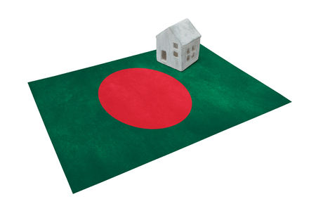 Small house on a flag - Living or migrating to Bangladeshの写真素材