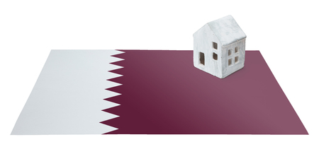 Small house on a flag - Living or migrating to Qatarの写真素材