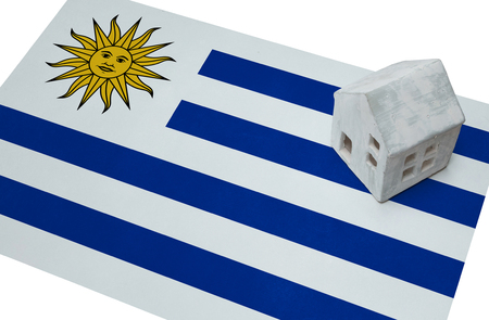 Small house on a flag - Living or migrating to Uruguayの写真素材