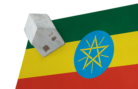 Small house on a flag - Living or migrating to Ethiopiaの写真素材