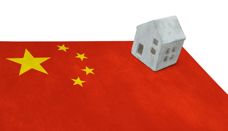 Small house on a flag - Living or migrating to Chinaの写真素材