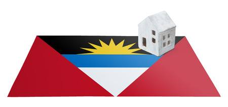 Small house on a flag - Living or migrating to Antigua and Barbudaの写真素材