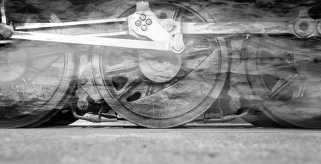 Steam locomotive wheels or steam train wheels and rods closeup for background
