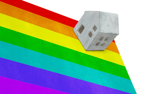 Small house on flag - Rainbow flagの写真素材