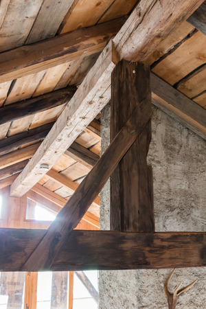 Wooden contruction on an old house in Austriaの写真素材