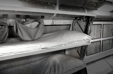 Interior of an old submarine - Limited space and lots of equipmentの写真素材