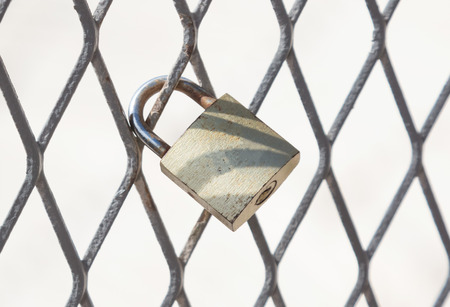 Love padlock on a fence in Greeceの写真素材
