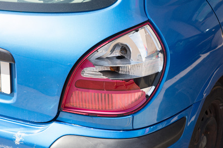 Close-up of busted taillight on rear end of a modern carの写真素材