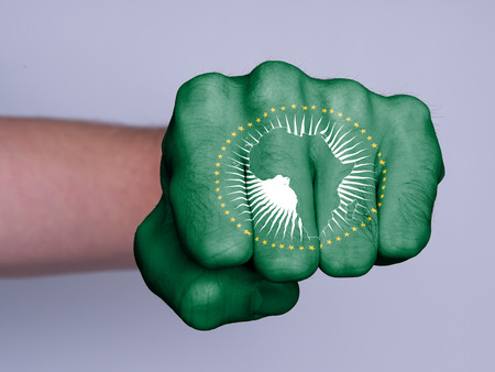 Very hairy knuckles from the fist of a man punching - African Unionの写真素材