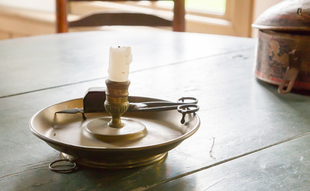 Candle in old fashioned retro holder - Daytimeの写真素材