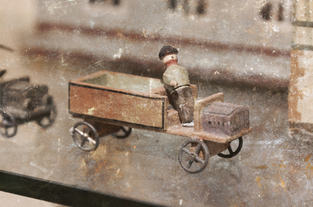 Vintage toy car, isolated, selective focus - Toys from the pastの写真素材
