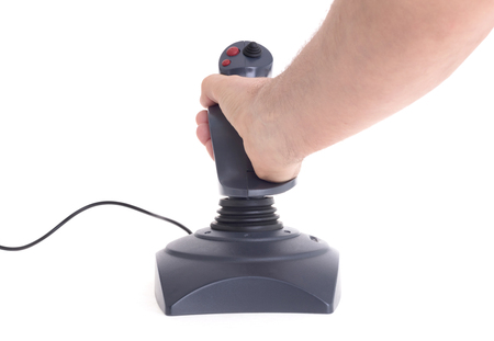 Hand holding gaming joystick, isolated on a white backgroundの写真素材