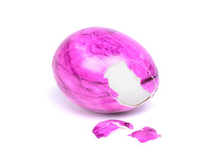 Painted egg, pealed easter egg - Isolated on whiteの写真素材