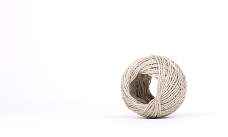 Small ball of rope isolated on a white backgroundの写真素材