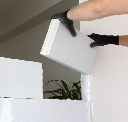 Building a small wall with lightweight concrete blocks - Do it yourselfの写真素材