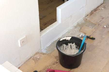 Building a small wall with lightweight concrete blocks - Do it yourselfの写真素材