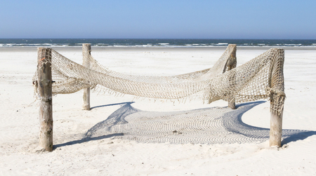 Fishnet on a beach in the Netherlandsの写真素材