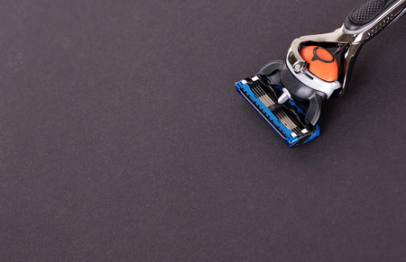 Modern razor isolated on a solid background