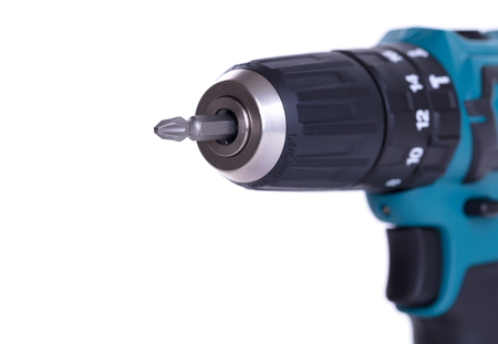 Cordless screwdriver or power drill isolated on a black backgroundの写真素材