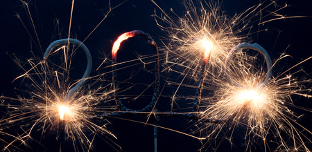 Sparkler isolated on a solid black background, 2019, happy newyear!の写真素材