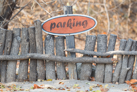 Parking sign on a wooden fence - Botswanaの写真素材