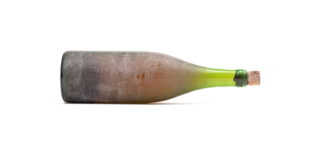 Old bottle of wine, covered in dust, isolated on whiteの写真素材