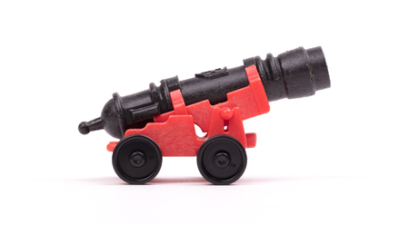Old plastic toy, canon, isolated on whiteの写真素材