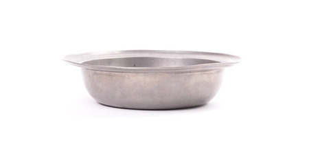 Very old tin pot, isolated on whiteの写真素材