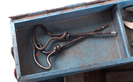 Old toolbox filled with vintage tools, isolatedの写真素材