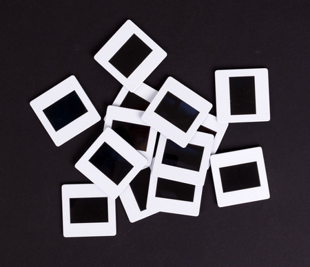 Old slides isolated on a black background