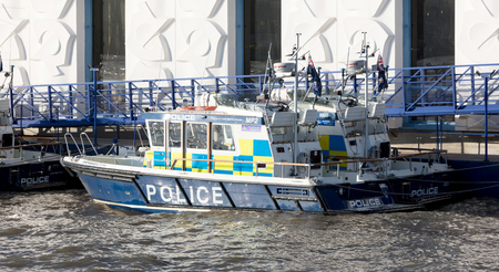 London, United Kingdom - Ferbuari 21, 2019. Police boat on the River Thames, London England.のeditorial素材