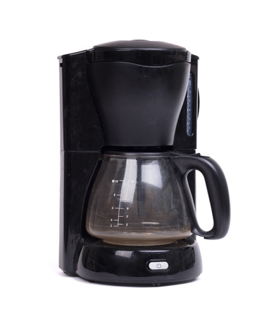 Old dirty coffee machine, isolated on a white backgroundの写真素材