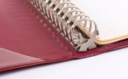 Old binder folder isolated on a white backgroundの写真素材