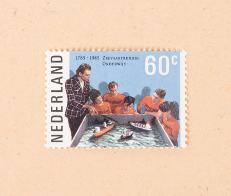 THE NETHERLANDS 1985: A stamp printed in the Netherlands shows the dutch Maritime school, circa 1985のeditorial素材