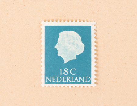 THE NETHERLANDS 1970: A stamp printed in the Netherlands shows queen Juliana, circa 1970のeditorial素材