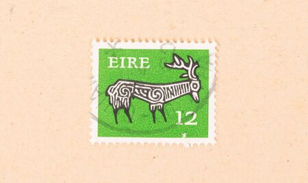 IRELAND - CIRCA 1980: A stamp printed in Ireland shows a drawing of an animal, circa 1980の写真素材