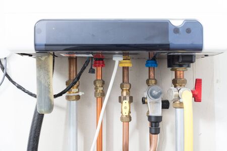 Home`s heating system, six tubes connected to the system, providing hot water and heatingの写真素材