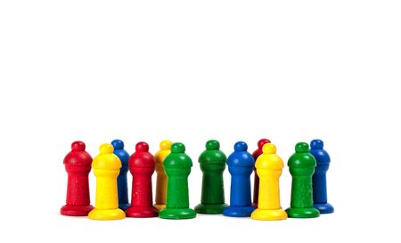 Wooden pawns of a leisure game, isolated on whiteの写真素材