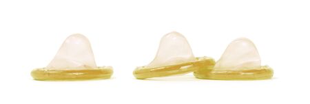 Yellow condom, isolated on a white background