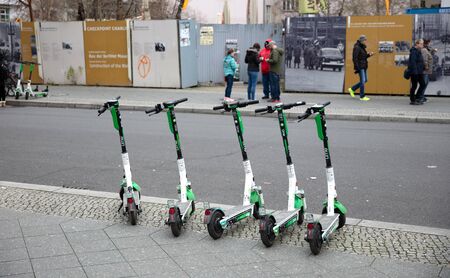 Berlin, Germany - December, 2019: E-mobility in Germany: discarded electric scooters on the streets...