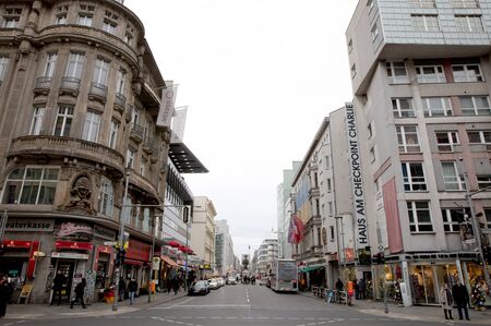Berlin, Germany - December 20, 2019: People visit famous Checkpoint Charlie in Berlin. During the Cold War it was the best known crossing of Berlin Wallのeditorial素材