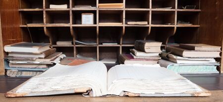 Very old desk, full of old books and old paper, the Netherlands, between 1800 and 1900 ad.