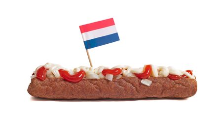 One frikadel with ketchup, mayonnaise on chopped onions, a Dutch fast food snack called 'frikadel speciaal', the Netherlandsの写真素材