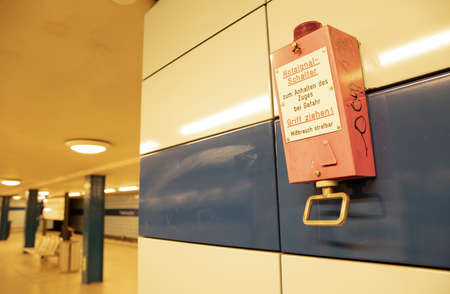 Emergency Brake at subway station in Berlin - Pull handle to stop the trainのeditorial素材