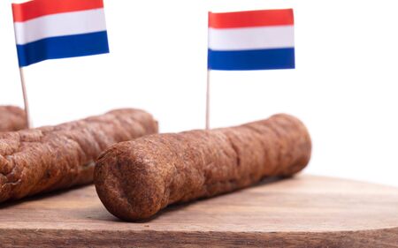 Wooden tray with frikadellen, a Dutch fast food snack, isolatedの写真素材