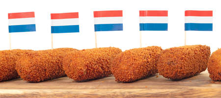 Brown crusty dutch kroketten on a serving tray, isolated on a white backgroundの写真素材